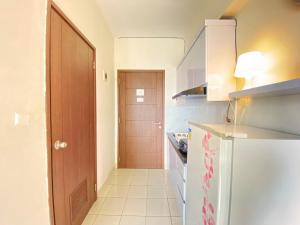 Homey Studio Room at Harvard Jatinangor Apartment By Travelio
