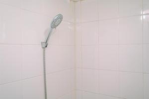 Comfy 2BR Apartment at Bassura City By Travelio