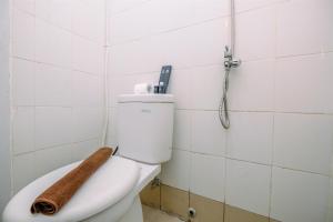 Comfy 2BR Apartment at Bassura City By Travelio