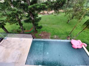 Villa kota bunga puncak bogor with pool & biliard