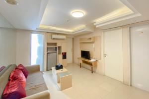 Comfort Stay 2BR at Bassura City Apartment By Travelio
