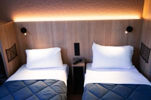 Hotels Premiere Classe Paris-Ouest Gennevilliers : photos des chambres