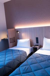 Hotels Premiere Classe Paris-Ouest Gennevilliers : photos des chambres