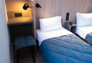 Hotels Premiere Classe Paris-Ouest Gennevilliers : photos des chambres