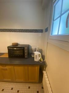 Appartements Jardin Secret - Maison Proche de l-Hippodrome : photos des chambres