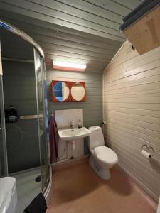 Idyllisk minihus i landlige omgivelser - med 5 sengeplasser og parkering