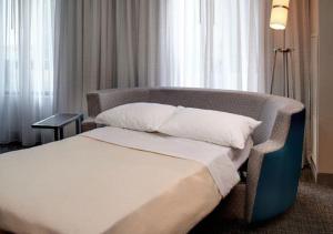 One-Bedroom King Suite with Sofa Bed room in Courtyard by Marriott Kalamazoo Portage