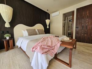 Loch Tulum Condos by Bunik