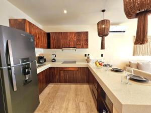 Loch Tulum Condos by Bunik