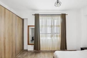 The nest 2BR Apartment with Prime location,Gym and Fast Wifi
