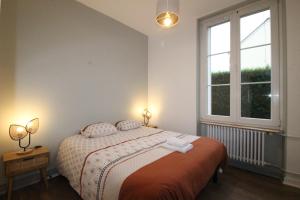 Appartements Plain-Pied - 5 couchages - Billard - BabyFoot - Terrasse - Jardin - Veranda - 4 chambres & canape convertible - Netflix - Amazon Prime - WIFI - Stationnement gratuit devant - Verdun Centre - Gere par Presta-Zen-Services : photos des chambres