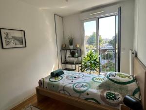 Appartements Le Timbaud, T4 cosy, balcon, parking, aux portes de Paris : photos des chambres