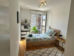Appartements Le Timbaud, T4 cosy, balcon, parking, aux portes de Paris : photos des chambres