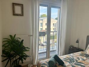 Appartements Le Timbaud, T4 cosy, balcon, parking, aux portes de Paris : photos des chambres