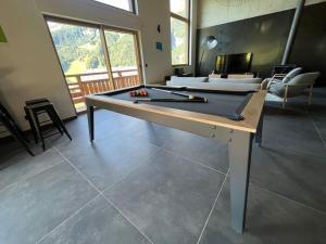Chalets Chalet mitoyen - Jacuzzi - Cousinade I : photos des chambres
