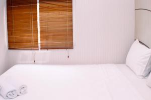 Nice and Best Deal 2BR at Green Pramuka City Apartment By Travelio