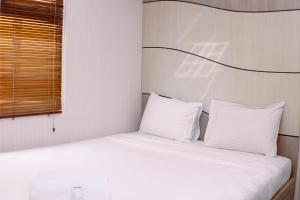 Nice and Best Deal 2BR at Green Pramuka City Apartment By Travelio