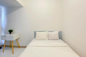 Homey and New Studio at Tokyo Riverside PIK 2 Apartment By Travelio