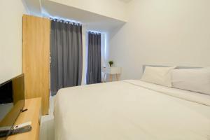 Homey and New Studio at Tokyo Riverside PIK 2 Apartment By Travelio