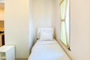 Cozy and Modern Look Studio Apartment Capitol Park Residence By Travelio