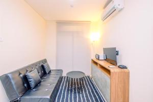 Spacious and Elegant 1BR Apartment Pejaten Park Residence By Travelio