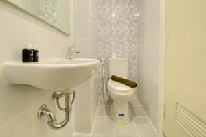 Warm and Homey Studio Tokyo Riverside PIK 2 Apartment By Travelio