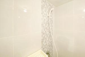 Homey Living 2BR at Tokyo Riverside PIK 2 Apartment By Travelio