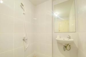 Homey and Comfortable 2BR at Tokyo Riverside PIK 2 Apartment By Travelio