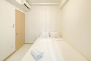 Homey and Comfortable 2BR at Tokyo Riverside PIK 2 Apartment By Travelio