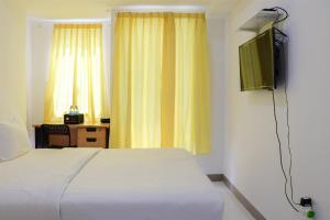 Compact and Tidy Studio at Tokyo Riverside PIK 2 Apartment By Travelio