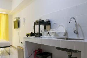 Compact and Tidy Studio at Tokyo Riverside PIK 2 Apartment By Travelio