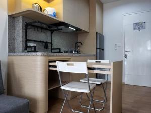 Minimalist and Cozy 2BR at La Hub City Apartment By Travelio