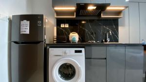 Cozy Living and Warm Studio Apartment at West Vista By Travelio