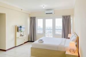 Tidy Studio (No Kitchen) Grand Palace Kemayoran Apartment (Free IPL & Utilities) By Travelio