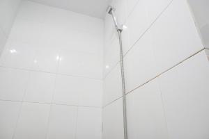 Cozy and Well Designed 2BR at Green Pramuka City Apartment By Travelio