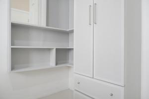 Cozy and Well Designed 2BR at Green Pramuka City Apartment By Travelio