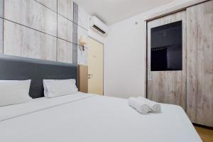 Good Deal and Comfortable 3BR Apartment M-Town Residence By Travelio