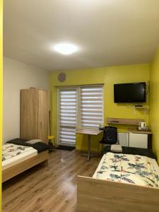 Noclegi Julia pokoje 1-3 parter Chodkiewicza śniadanie kontynentalne