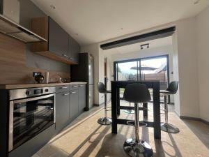 Maisons de vacances Gite le Davidson, maison avec jardin : photos des chambres