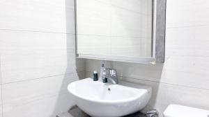 Good Deal and Restful 1BR Ciputra International Apartment By Travelio