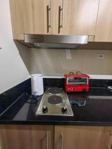 1BR Condotel with Balcony at FAME Residences #FM47