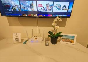 1BR Condotel with Balcony at FAME Residences #FM51