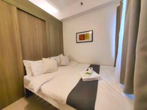 1BR Condotel with Balcony at FAME Residences #FM53