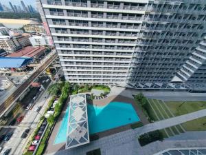 1BR Condotel with Balcony at FAME Residences #FM53