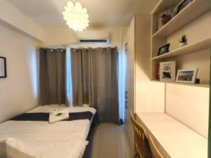 1BR Condotel with Balcony at FAME Residences #FM53