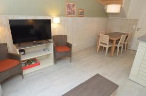 Appartements Maison Normandy Garden : photos des chambres