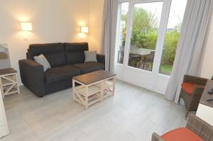 Appartements Maison Normandy Garden : photos des chambres