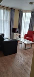 Logement De witte klok