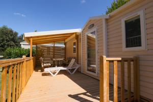 Villages vacances Camping Paradis Marmotel : photos des chambres