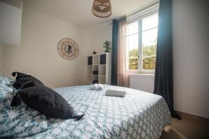 Appartements L-onde Douce - T2 Cosy - Proximite tram T3 & T7 : photos des chambres